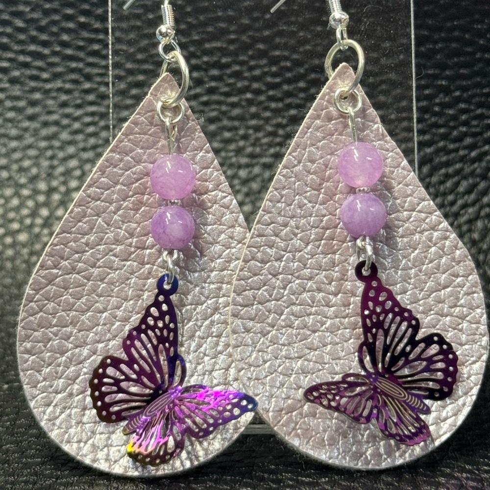 Handmade purple teardrop faux leather earrings with butterfly charms